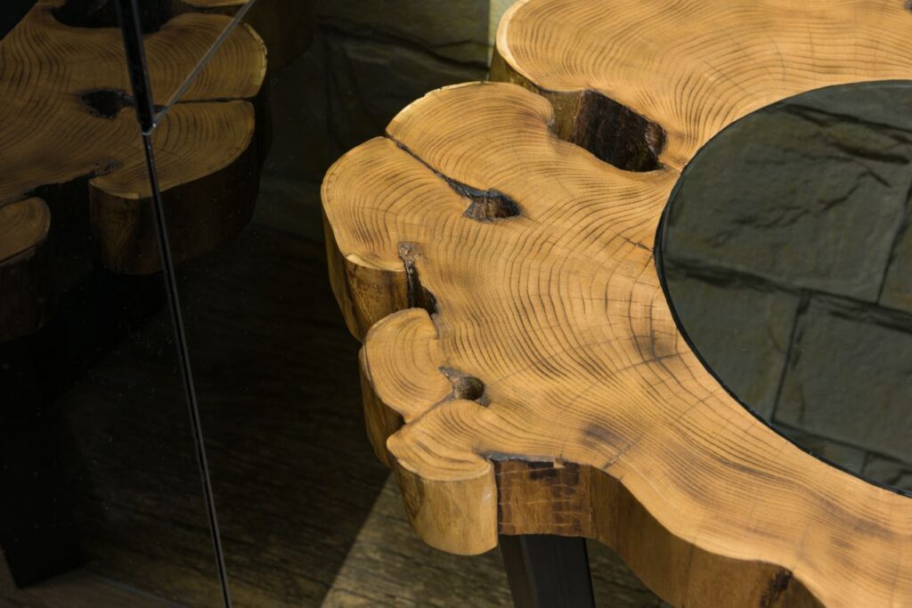 Mastering the First Impression: Your intriguing post title goes here From above of wooden table with curved lines and spots on surface reflecting on glass wall
